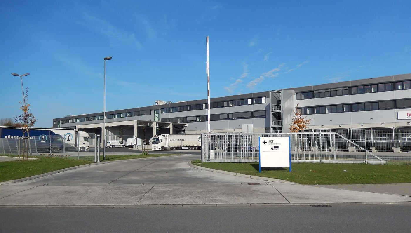 Aircraft cargo being handled at an air cargo terminal building