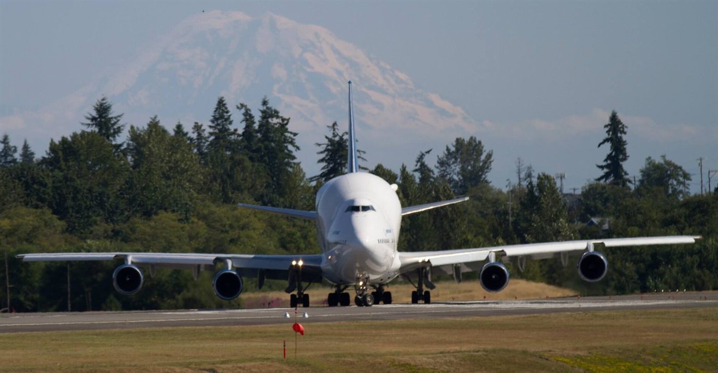 Wide-body cargo freighter aircraft on the ramp at an airport