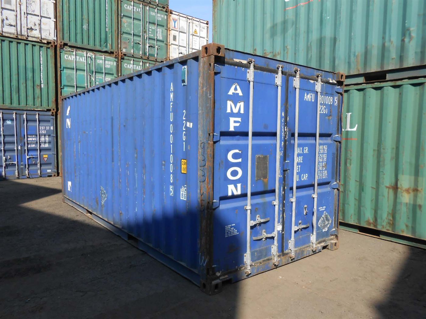Rows of shipping containers stored in a container storage yard
